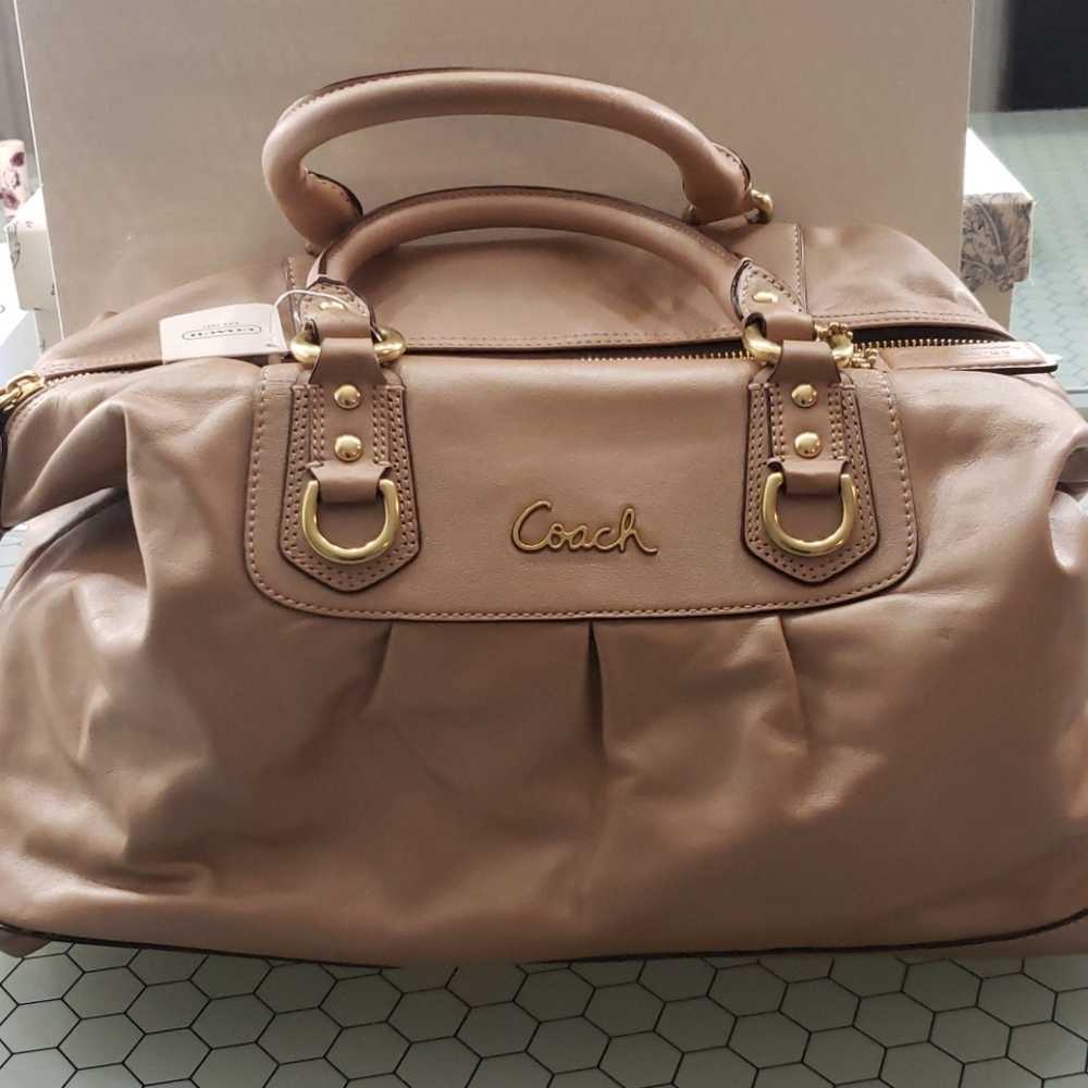 Rose gold Coach bag